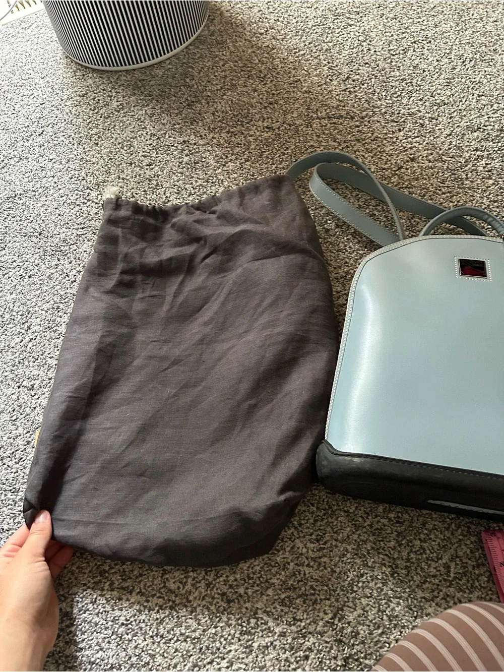 Dooney & Bourke “Pod Backpack” light blue
